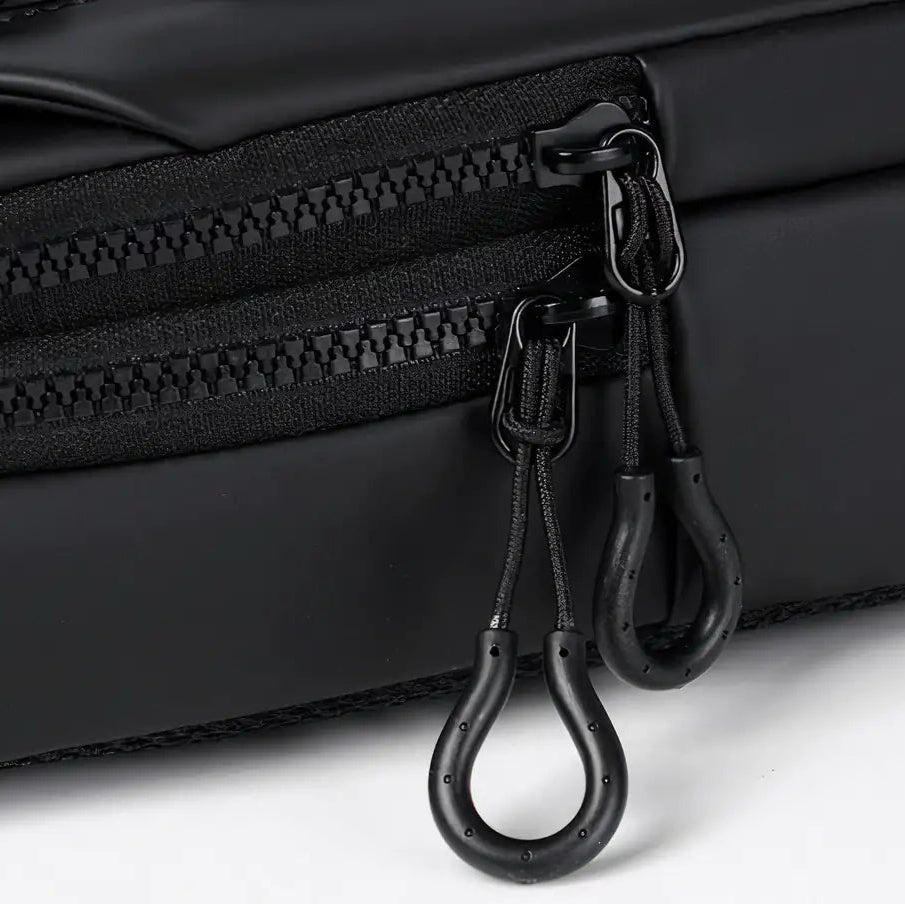 DS Sling – Crossbody Tas met USB ritsen