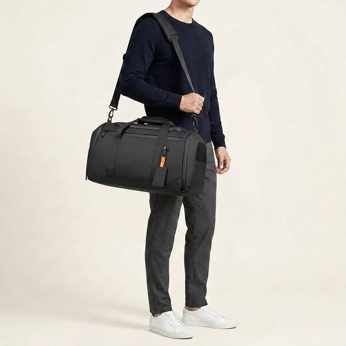 DS Iron 26L Reistas – model met reistas over de schouder (studio-serie)