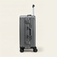 Zijkant van de donkergrijze DS Front handbagage koffer met aluminium frame, twee TSA-sloten en zijhandvat