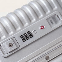 TSA-cijferslot en USB-poorten bovenop de zilveren DS Front handbagage koffer